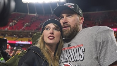 Kansas City Chiefs tight end Travis Kelce, right, appears with singer Taylor Swift after the Chiefs victory over the Buffalo Bills (AP)