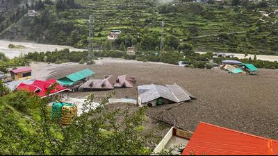 The scene of flash floods in Dharali. (PTI) The scene of flash floods in Dharali. (PTI)