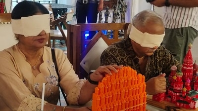Participants explored miniature models of iconic landmarks, attempting to identify them using only their sense of touch Participants explored miniature models of iconic landmarks, attempting to identify them using only their sense of touch