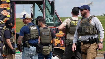 The federal law enforcement and city police officers made 23 arrests on the first day of the federal takeover of the Washington city's police department. (Getty Images via AFP) The federal law enforcement and city police officers made 23 arrests on the first day of the federal takeover of the Washington city's police department. (Getty Images via AFP)