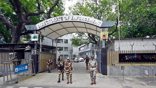 Security personnel stand guard outside the Enforcement Directorate (ED) office in New Delhi. (HT File)