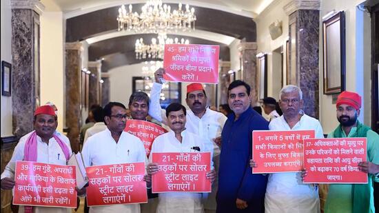 Samajwadi Party leader Shivpal Yadav, along with the party MLAs, showing placards while protesting against the state government during the third day of the Monsoon session at UP assembly in Lucknow on Wednesday. (Deepak Gupta/HT Photo)