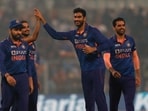 Venkatesh Iyer (centre) celebrates with India cricketers