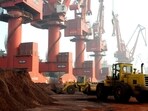 FILE PHOTO: Workers transport soil containing rare earth elements for export at a port in Lianyungang, Jiangsu province, China FILE PHOTO: Workers transport soil containing rare earth elements for export at a port in Lianyungang, Jiangsu province, China