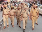 Police personnel during a flag march ahead of the Independence Day in Amritsar on Wednesday. (PTI)