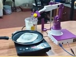 The robot, made by a Bengaluru engineer, could spread batter on a hot pan and make a crispy golden brown dosa.