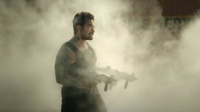 Aamir Khan in a still from Coolie. Aamir Khan in a still from Coolie.