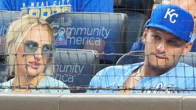Patrick Mahomes and wife Brittany watch play in the sixth inning of the game between the Kansas City Royals and Athletics at Kauffman Stadium. (IMAGN IMAGES via Reuters Connect)