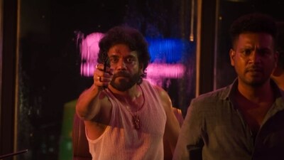 Nagarjuna as Simon in Coolie Nagarjuna as Simon in Coolie