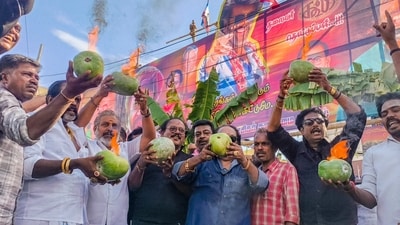 Rajinikanth's Madurai fans prayed for his success outside the theatre before heading in to watch Coolie. (PTI) Rajinikanth's Madurai fans prayed for his success outside the theatre before heading in to watch Coolie. (PTI)