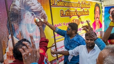 While others in Madurai poured milk on his pictures to signify his demigod status in their eyes. (PTI) While others in Madurai poured milk on his pictures to signify his demigod status in their eyes. (PTI)
