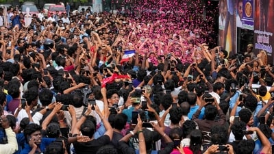 From throwing confetti and bursting crackers to recording all the revelry for keepsake, it looks like Rajinikanth fans had a ball. (PTI) From throwing confetti and bursting crackers to recording all the revelry for keepsake, it looks like Rajinikanth fans had a ball. (PTI)