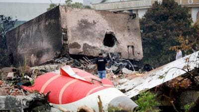 FILE PHOTO: A firefighter stands next to the crashed Air India Boeing 787-8 Dreamliner aircraft, in Ahmedabad. (REUTERS) FILE PHOTO: A firefighter stands next to the crashed Air India Boeing 787-8 Dreamliner aircraft, in Ahmedabad. (REUTERS)