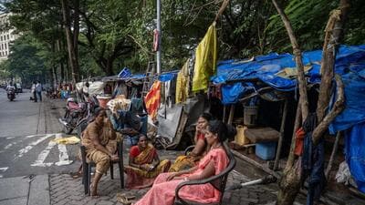 Mumbai, India - August 14, 2025: Residence of the Jai Bhim nagar slam staying on the footpath at Powai in Mumbai, India, on Thursday, August 14, 2025. (Photo by Satish Bate/ Hindustan Times) (Hindustan Times) Mumbai, India - August 14, 2025: Residence of the Jai Bhim nagar slam staying on the footpath at Powai in Mumbai, India, on Thursday, August 14, 2025. (Photo by Satish Bate/ Hindustan Times) (Hindustan Times)