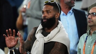 NFL football wide receiver Odell Beckham Jr., dances after a second-round match between France's Gael Monfils and Britain's Jack Draper (AP)