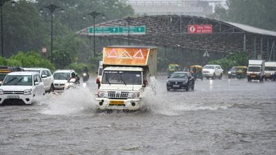 Vehicles wade through a waterlogged stretch during heavy rain on the Maharana Pratap Chowk near MDI Institute, in Gurugram on Thursday. (Parveen Kumar/HT Photo) Vehicles wade through a waterlogged stretch during heavy rain on the Maharana Pratap Chowk near MDI Institute, in Gurugram on Thursday. (Parveen Kumar/HT Photo)