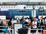 Passengers wait at an Air Canada check-in counter, ahead of a potential strike by flight attendants of the airline, at the Toronto Pearson International Airport in Mississauga, Ontario, Canada, August 15, 2025.