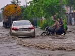 Commuters make their way amid waterlogging on the Rahon road on Thursday. (Gurpreet Singh/HT) Commuters make their way amid waterlogging on the Rahon road on Thursday. (Gurpreet Singh/HT)