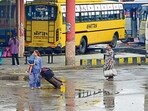 Passengers waiting for buses at Ludhiana bus stand on Thursday. (HT Photo)