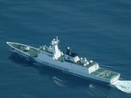 FILE PHOTO: An aerial view of a China Coast Guard ship navigating near the disputed Scarborough Shoal, as Philippine Coast Guard aircraft carrying journalists patrols the area, days after two Chinese vessels collided in the area while allegedly trying to block a Philippine supply mission, in the South China Sea, August 13, 2025. REUTERS/Adrian Portugal/File Photo