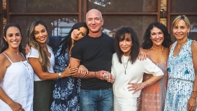 Amazon founder Jeff Bezos with his mother Jacklyn (R) and wife Lauren (L) Amazon founder Jeff Bezos with his mother Jacklyn (R) and wife Lauren (L)