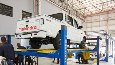 Mahindra & Mahindra has submitted a letter of interest to the Maharashtra government to acquire 350 acres of land in Igatpuri, Maharashtra (Picture for representational purposes only) Photographer: Waldo Swiegers/Bloomberg (Bloomberg) Mahindra & Mahindra has submitted a letter of interest to the Maharashtra government to acquire 350 acres of land in Igatpuri, Maharashtra (Picture for representational purposes only) Photographer: Waldo Swiegers/Bloomberg (Bloomberg)