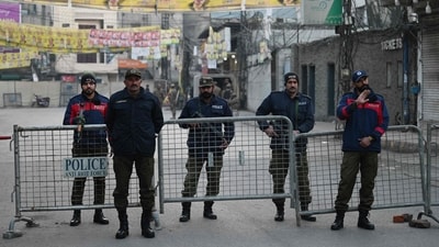 Policemen stand guard in Pakistan's national elections in Lahore. (For representation/AFP)