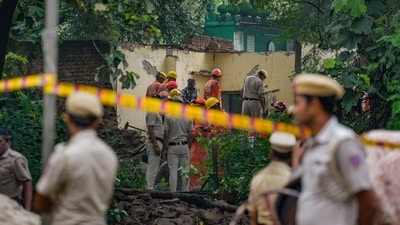 Security personnel at the site after a portion of the structure at Humayun's Tomb collapses, in New Delhi (PTI) Security personnel at the site after a portion of the structure at Humayun's Tomb collapses, in New Delhi (PTI)