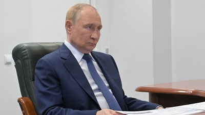 Russia's President Vladimir Putin attends a meeting with Magadan region's Governor Sergei Nosov (via REUTERS)