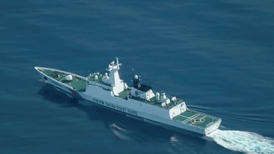 FILE PHOTO: An aerial view of a China Coast Guard ship navigating near the disputed Scarborough Shoal, as Philippine Coast Guard aircraft carrying journalists patrols the area, days after two Chinese vessels collided in the area while allegedly trying to block a Philippine supply mission, in the South China Sea, August 13, 2025. REUTERS/Adrian Portugal/File Photo (REUTERS)
