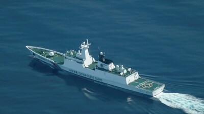 An aerial view of a China Coast Guard ship navigating near the disputed Scarborough Shoal, as Philippine Coast Guard aircraft carrying journalists patrol the area. (REUTERS)
