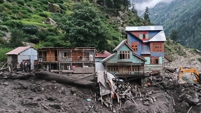 Rescuers (L) inspect the site of a flashflood at a village in Kishtwar district on August 14, 2025. (AFP) Rescuers (L) inspect the site of a flashflood at a village in Kishtwar district on August 14, 2025. (AFP)