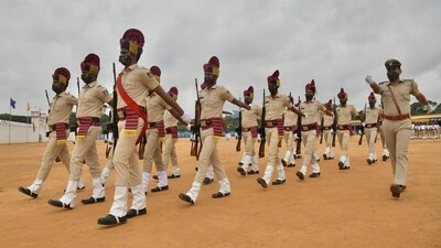 Police personnel march at the Field Marshal Manekshaw Parade Ground in Bengaluru. (Manjunath Kiran / AFP) (Representative image) Police personnel march at the Field Marshal Manekshaw Parade Ground in Bengaluru. (Manjunath Kiran / AFP) (Representative image)