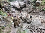 Indo-Tibetan Border Police (ITBP) team rescues a pilgrim using the rope-based traverse crossing technique, following a flash flood in the Tangling area along the Kinner Kailash Yatra route, on Wednesday. (ITBP/ANI Photo)
