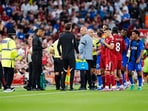 Referee Anthony Taylor during a stop in play after Bournemouth's Antoine Semenyo, second right, informs the referee of a possible racial comment from the crowd.
