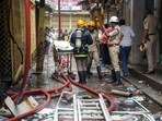 Bengaluru: Fire fighters at the site after a fire incident, at Nagarathpete in Bengaluru, Saturday. (PTI Photo/Shailendra Bhojak) Bengaluru: Fire fighters at the site after a fire incident, at Nagarathpete in Bengaluru, Saturday. (PTI Photo/Shailendra Bhojak)