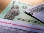 President Donald Trump's name is printed on a stimulus check issued by the IRS President Donald Trump's name is printed on a stimulus check issued by the IRS