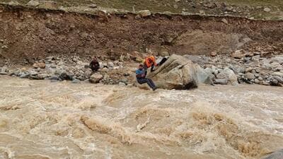 A stranded resident being rescued on Saturday after a cloudburst in the Miyar Valley of Lahaul-Spiti district. Two devotees hailing from Delhi were killed when the two were hit by shooting stones while they were on their way to Yulla Kanda Krishna temple in the Rora Valley of Kinnaur district in Himachal Pradesh to celebrate Shri Krishna Janmashtami on Saturday, officials said. (HT Photo) A stranded resident being rescued on Saturday after a cloudburst in the Miyar Valley of Lahaul-Spiti district. Two devotees hailing from Delhi were killed when the two were hit by shooting stones while they were on their way to Yulla Kanda Krishna temple in the Rora Valley of Kinnaur district in Himachal Pradesh to celebrate Shri Krishna Janmashtami on Saturday, officials said. (HT Photo)