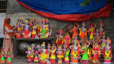 Vendors were seen selling idols of lord Krishna and Radha, for the celebrations of Janmashmati in Ahmedabad. (AP)