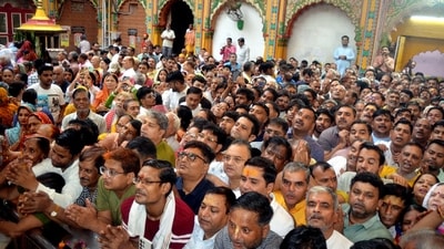 People on Saturday throng at Dwarkadhish Temple to offer prayers on the occasion of the 'Shri Krishna Janmashtami' festival, in Mathura. (PTI)