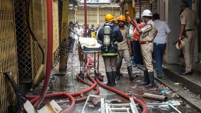 Bengaluru: Fire fighters at the site after a fire incident, at Nagarathpete in Bengaluru, Saturday. (PTI Photo/Shailendra Bhojak) (PTI) Bengaluru: Fire fighters at the site after a fire incident, at Nagarathpete in Bengaluru, Saturday. (PTI Photo/Shailendra Bhojak) (PTI)