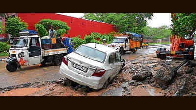 Potholes form when rainwater seeps into cracks, weakening the base layers. The constant weight of traffic does the rest, loosening the material until a shallow dip becomes a deep cavity. (HT File Photo) Potholes form when rainwater seeps into cracks, weakening the base layers. The constant weight of traffic does the rest, loosening the material until a shallow dip becomes a deep cavity. (HT File Photo)