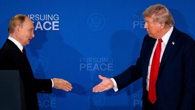Russia's President Vladimir Putin and US President Donald Trump reach out to shake hands during a joint news conference at Joint Base Elmendorf-Richardson in Anchorage, Alaska, US, on Friday. (Bloomberg) Russia's President Vladimir Putin and US President Donald Trump reach out to shake hands during a joint news conference at Joint Base Elmendorf-Richardson in Anchorage, Alaska, US, on Friday. (Bloomberg)