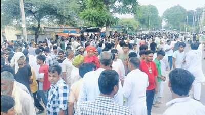 Victim’s family members and supporters holding a protest demanding the arrest of the accused, at Dhigawa in Bhiwani on Saturday. (HT) Victim’s family members and supporters holding a protest demanding the arrest of the accused, at Dhigawa in Bhiwani on Saturday. (HT)