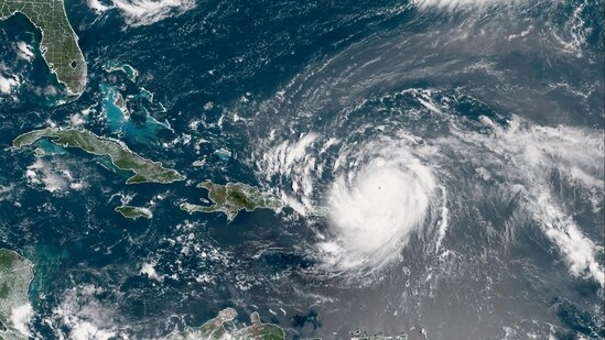 The storm is not slamming straight into Puerto Rico, the Virgin Islands, or the Leeward Islands, but the outer bands are already feeling the impact.
(Photo by Handout / NOAA / AFP) (AFP PHOTO / NOAA)