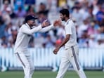 Washington Sundar celebrates a wicket with Indian captian Shubman Gill.