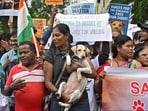 Dog lovers and activists attend a protest rally, after India's top court last week ordered authorities to relocate all stray dogs in Delhi.