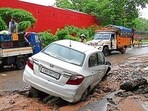 Potholes form when rainwater seeps into cracks, weakening the base layers. The constant weight of traffic does the rest, loosening the material until a shallow dip becomes a deep cavity. (HT File Photo)