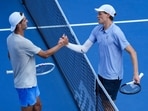 Terence Atmane and Jannik Sinner shake hands at the net after their Cincinnati Masters semifinal.