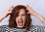 A woman claimed that her boss almost threw wine at her at an event. 
